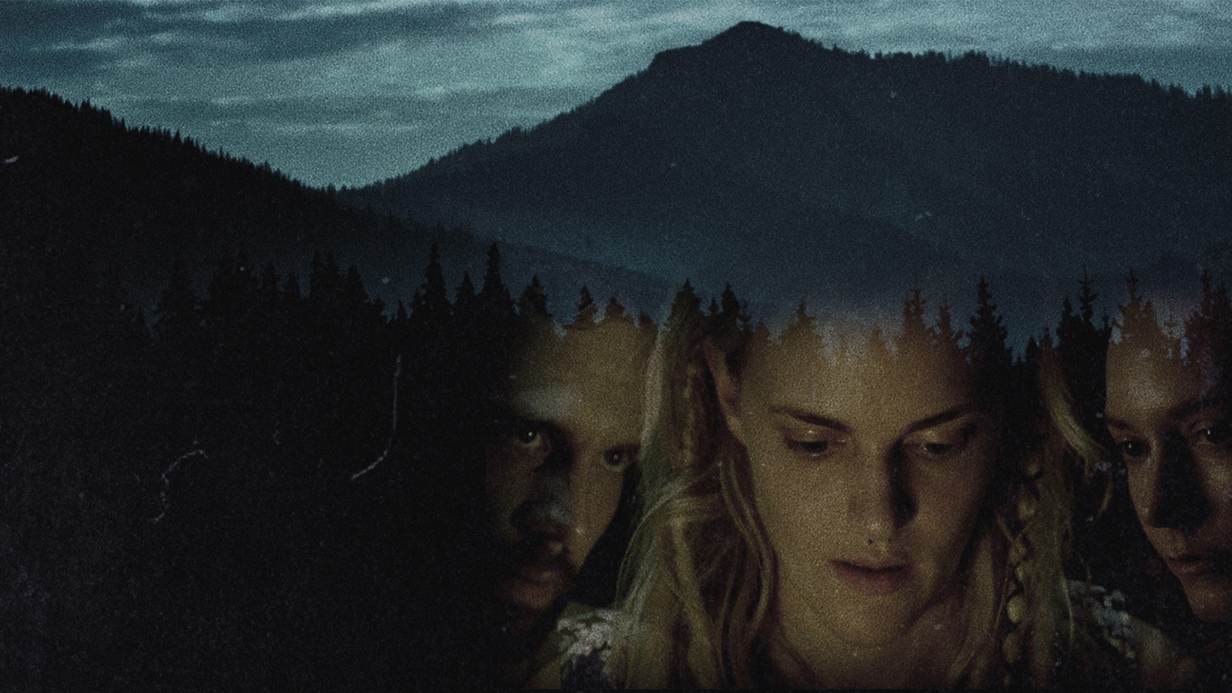 Still film artwork featuring its three principal characters against an Appalachian mountain landscape